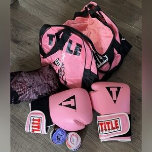 Pink Title Classic Boxing Set
Includes: Gloves, Lots of hand wraps, and bag
